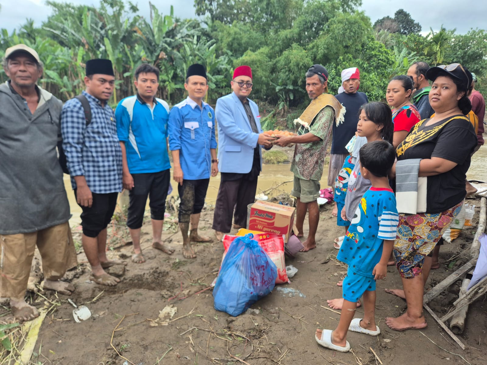 DPW BKPRMI Sumut Membersamai DPD BKPRMI Medan Serahkan Bantuan Korban Terampak